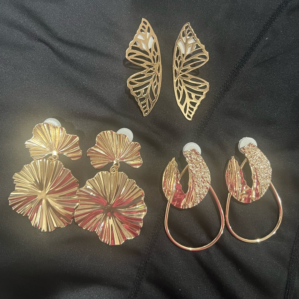 3 pairs of golden earrings